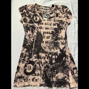Stand out with this stylish and trendy razor back top